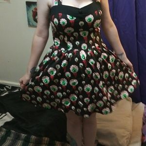 Gothic pin-up eyeball dress.
